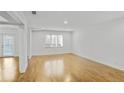 Bright living room with hardwood floors and lots of natural light at 3036 Vinings Ferry Se Dr, Atlanta, GA 30339