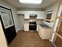 Renovated kitchen featuring new cabinets and appliances at 2043 Chicago Nw Ave, Atlanta, GA 30314