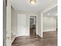 Inviting entryway featuring wood floors and neutral wall colors at 855 Riverbend Sw Dr, Lilburn, GA 30047
