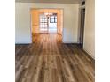 View through dining room to living room with hardwood floors at 134 Amherst Nw Pl, Atlanta, GA 30327