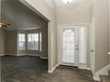 Bright entryway with tile floors and view into living room at 4905 Bridle Point Pkwy, Snellville, GA 30039