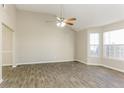 Spacious living room with tile floors and large windows at 4905 Bridle Point Pkwy, Snellville, GA 30039