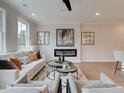 Bright living room featuring a neutral color palette and cozy seating at 747 Trevett Way, Marietta, GA 30062