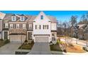 Beautiful 3 story home with 2-car garage and landscaped yard at 1 Ganel Ln, Alpharetta, GA 30009