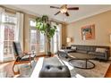 Living room with hardwood floors, large windows, and comfortable seating at 25 High Gate Trl, Decatur, GA 30030