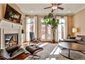 Living room with fireplace, hardwood floors, and comfortable seating at 25 High Gate Trl, Decatur, GA 30030