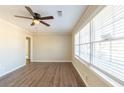 Spacious living room featuring hardwood floors and large windows at 2833 Lynda Pl, Decatur, GA 30032