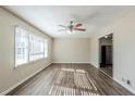 Spacious living room with hardwood floors and ceiling fan at 4312 Pleasant Forest Dr, Decatur, GA 30034