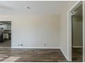 Bright living room with hardwood floors and kitchen view at 4312 Pleasant Forest Dr, Decatur, GA 30034