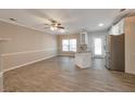 Open living room and kitchen with tile floors at 5321 Sherwin Dr, Norcross, GA 30093