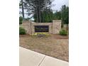 Brick entrance sign for The Collections at Wolf Creek community at 1366 Lucan Ln # Wc225, Lawrenceville, GA 30043