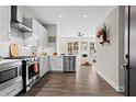 Modern kitchen with stainless steel appliances and white cabinets at 22 Airline Ne St # 106, Atlanta, GA 30312