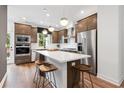 Modern kitchen with stainless steel appliances and an island at 1921 Rogers Ct, Atlanta, GA 30318