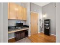 Entryway with built-in shelving and wood flooring at 943 Peachtree Ne St # 809, Atlanta, GA 30309