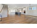 Open concept kitchen with island and stainless steel appliances at 152 Palm St, Holly Springs, GA 30115
