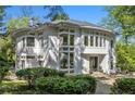 Stunning contemporary home with a circular design and large windows at 35 Robin Hood Ne Rd, Atlanta, GA 30309