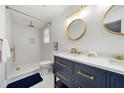 Elegant bathroom featuring a double vanity and walk-in shower at 3685 Manhattan Dr, Decatur, GA 30034