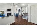 Bright entryway with hardwood floors and open staircase at 125 River Terrace Ct, Roswell, GA 30076