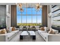 Luxurious common area with comfortable seating and stunning city views at 855 Peachtree Ne St # 2911, Atlanta, GA 30308