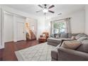 Bright and airy living area with hardwood floors and access to the staircase at 4204 Mastic Pointe # 24, Acworth, GA 30101
