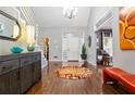 Bright and spacious entryway with hardwood floors and modern decor at 1013 Lenox Valley Ne Dr, Atlanta, GA 30324