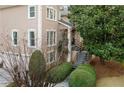 Side view of house showcasing architectural details and landscaping at 1013 Lenox Valley Ne Dr, Atlanta, GA 30324