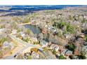 Bird's-eye view of house near lake in wooded area at 4720 W Forest Peak Ne, Marietta, GA 30066