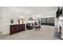 Spacious living room with fireplace and access to balcony at 1214 Highland Bluff Se Dr # 214, Atlanta, GA 30339