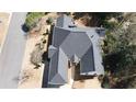 Aerial view of a home showcasing its roofline and landscaping at 620 Oakledge Nw Dr, Marietta, GA 30060