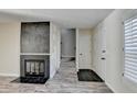 Living room with fireplace, stairs, and front door at 3495 Tulip Tree Ln, Duluth, GA 30096