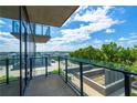Spacious balcony with city views and modern glass railings at 788 W Marietta Nw St # 212, Atlanta, GA 30318