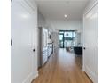 Bright hallway with hardwood floors and access to rooms at 788 W Marietta Nw St # 212, Atlanta, GA 30318