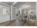 Dining room with hardwood floors, gray walls, and white trim at 54 Devonshire Dr, Alpharetta, GA 30022