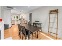 Open concept dining room with view into updated kitchen at 2662 Memorial Se Dr, Atlanta, GA 30317