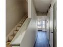 Home entryway with staircase and view into the living area at 3727 Conley Downs Ln, Decatur, GA 30034