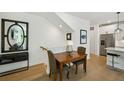 Small dining area with wooden table and chairs near kitchen at 403 Pratt Se Dr # 1009, Atlanta, GA 30315