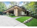 Modern home with a long driveway and landscaped grounds at 4373 Wieuca Ne Rd, Atlanta, GA 30342