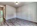 Spacious bedroom with hardwood floors and a large window at 121 Frontier Way, Mcdonough, GA 30253