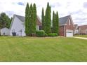 Side view of the house, showing additional landscaping at 160 Valley Brook Dr, Covington, GA 30016