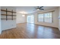 Open-concept living room featuring sliding glass doors to the patio at 2698 Farmstead Se Rd, Smyrna, GA 30080