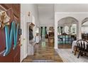 Bright and spacious entryway with hardwood floors and coat rack at 156 Vine Creek Dr, Acworth, GA 30101