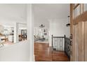 Bright and airy entryway with hardwood floors, view into living room and kitchen at 2148 Allgood Rd, Marietta, GA 30062