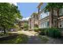 Apartment building showcasing its brick facade and landscaping at 272 14Th St # 23, Atlanta, GA 30309