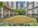 Relaxing courtyard with pergola and seating at 199 14Th Ne St # 1512, Atlanta, GA 30309