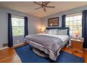 Spacious primary bedroom with a king-size bed and ample natural light at 2810 Frontier Trl, Atlanta, GA 30341
