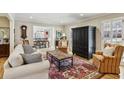 Spacious living room with hardwood floors, comfortable seating, and open floor plan at 3089 Castaway Ln, Atlanta, GA 30341