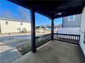 Relaxing covered porch with ceiling fan, perfect for enjoying the outdoors at 520 Mary Sw St, Atlanta, GA 30310