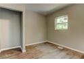 Simple bedroom with wood-look floors and a large closet at 1116 Northwest Nw Dr, Atlanta, GA 30318