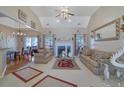 Spacious living room with fireplace, vaulted ceiling, and ample natural light at 3643 Southland Ne Dr, Buford, GA 30519