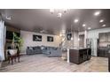 Open floor plan with a spacious living area and a modern kitchen at 529 Dasheill Ln, Atlanta, GA 30349